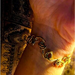 Silver and gold wire bracelet. Very unique!